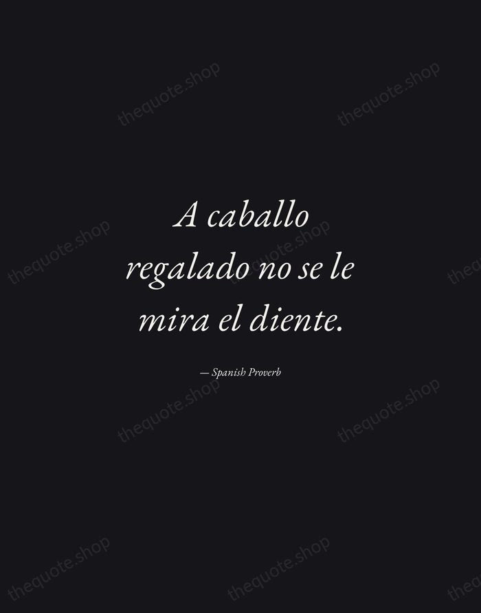 A caballo regalado no se le mira el diente. — Spanish Proverb — Manuscript Italic
